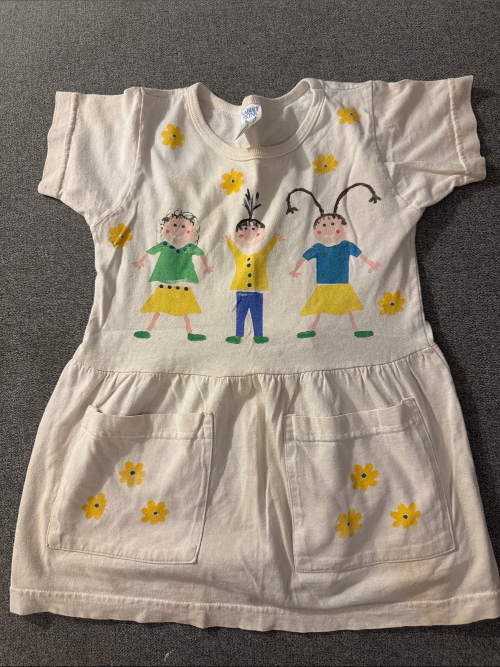 5/$15-Girls' Cream Dress with Hand-Painted Kids & Yellow Flowers